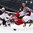 MINSK, BELARUS - MAY 15: USA's Tim Thomas #30 and Jake Gardiner #51 are too late getting across on this play as Latvia's Mikelis Redlihs #24 gives his team a 2-1 lead during preliminary round action at the 2014 IIHF Ice Hockey World Championship. (Photo by Andre Ringuette/HHOF-IIHF Images)

